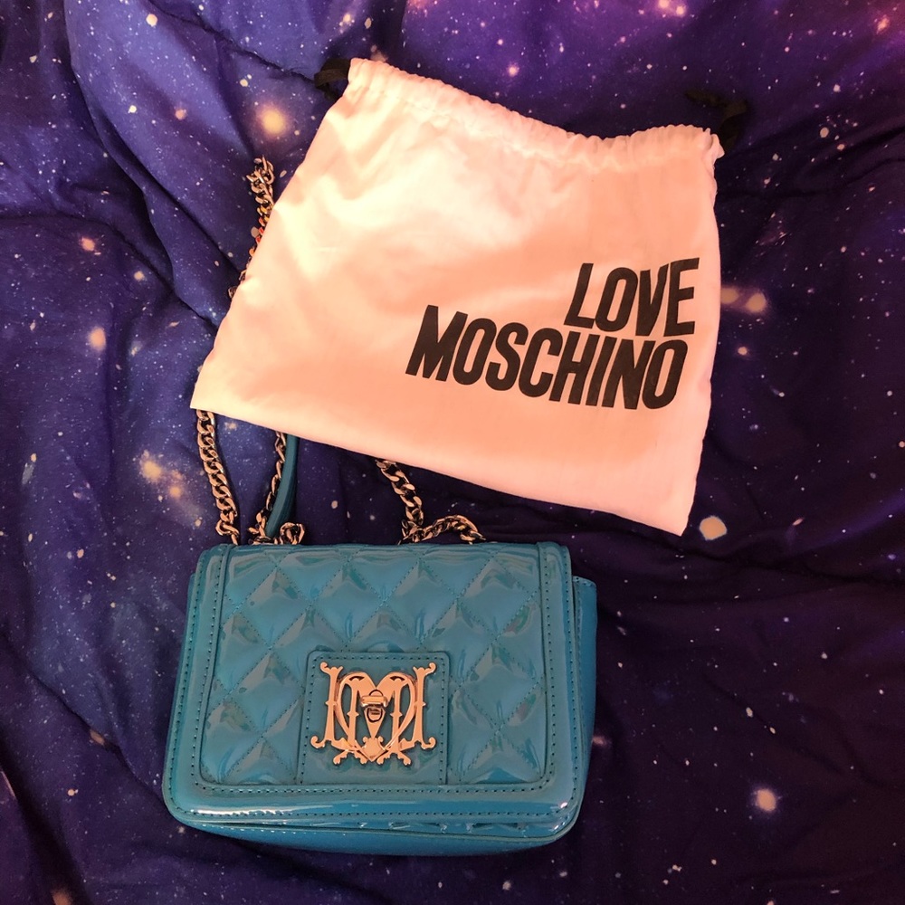 Moschino sky blue shoulder bag!! Offers welcomed